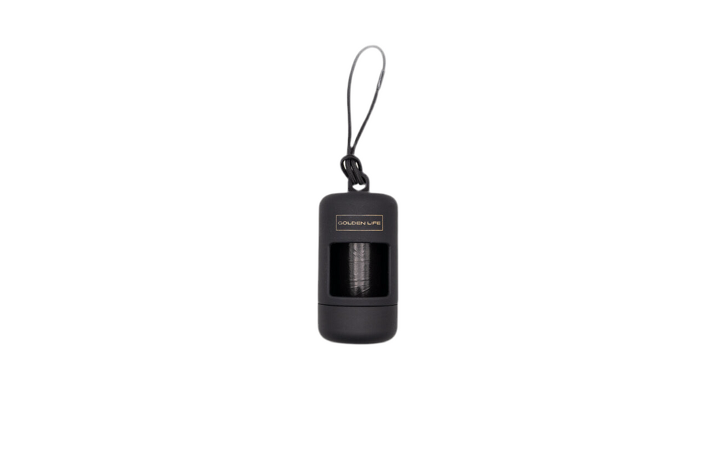 Shadow Black dog poop bag holder dispenser with clip, includes one roll of bags for easy leash attachment.