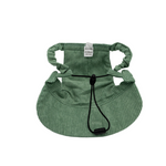 Back view of Moss & Mischief green corduroy dog hat showing adjustable chin strap and ear holes for secure fit.