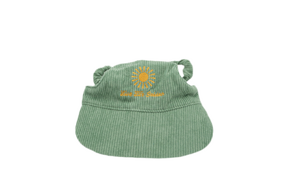 Moss & Mischief green corduroy dog hat with sunburst embroidery and ‘Live Life Golden’ text.