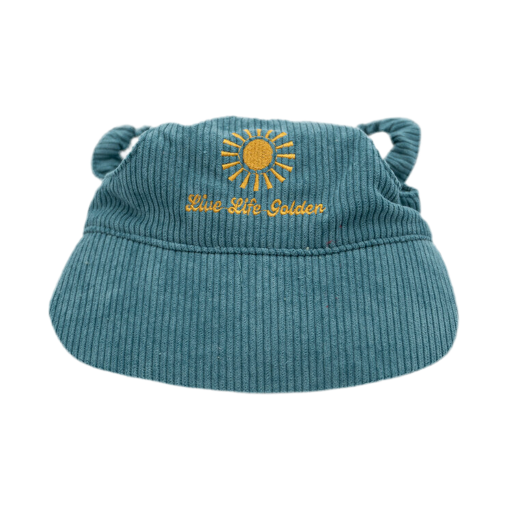 Blue corduroy dog hat with golden sunburst and ‘Live Life Golden’ embroidery from The Golden Life.