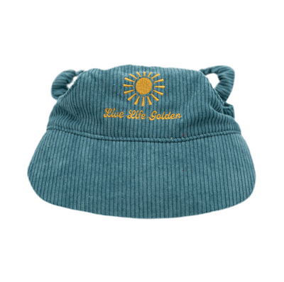 Blue corduroy dog hat with golden sunburst and ‘Live Life Golden’ embroidery from The Golden Life.