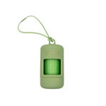 Pistachio light green dog poop bag holder dispenser with clip, includes one roll of bags for easy leash attachment.