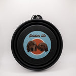 Black collapsible dog bowl 33.8 oz – durable, portable food and water bowl for dogs with The Golden Life logo.