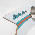 The Golden Life Kickflip Kibble Board dog feeder shaped like a skateboard with two stainless steel bowls, white board design with teal and orange racing stripes, and fixed black wheels. Get your Skateboard Dog Bowl today!