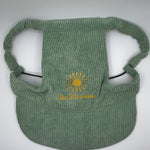 Green corduroy dog hat with ear holes and sun embroidery reading ‘Live Life Golden.’