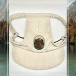 Cream corduroy dog hat with the Kodiak adventure paddleboard iron on patch.