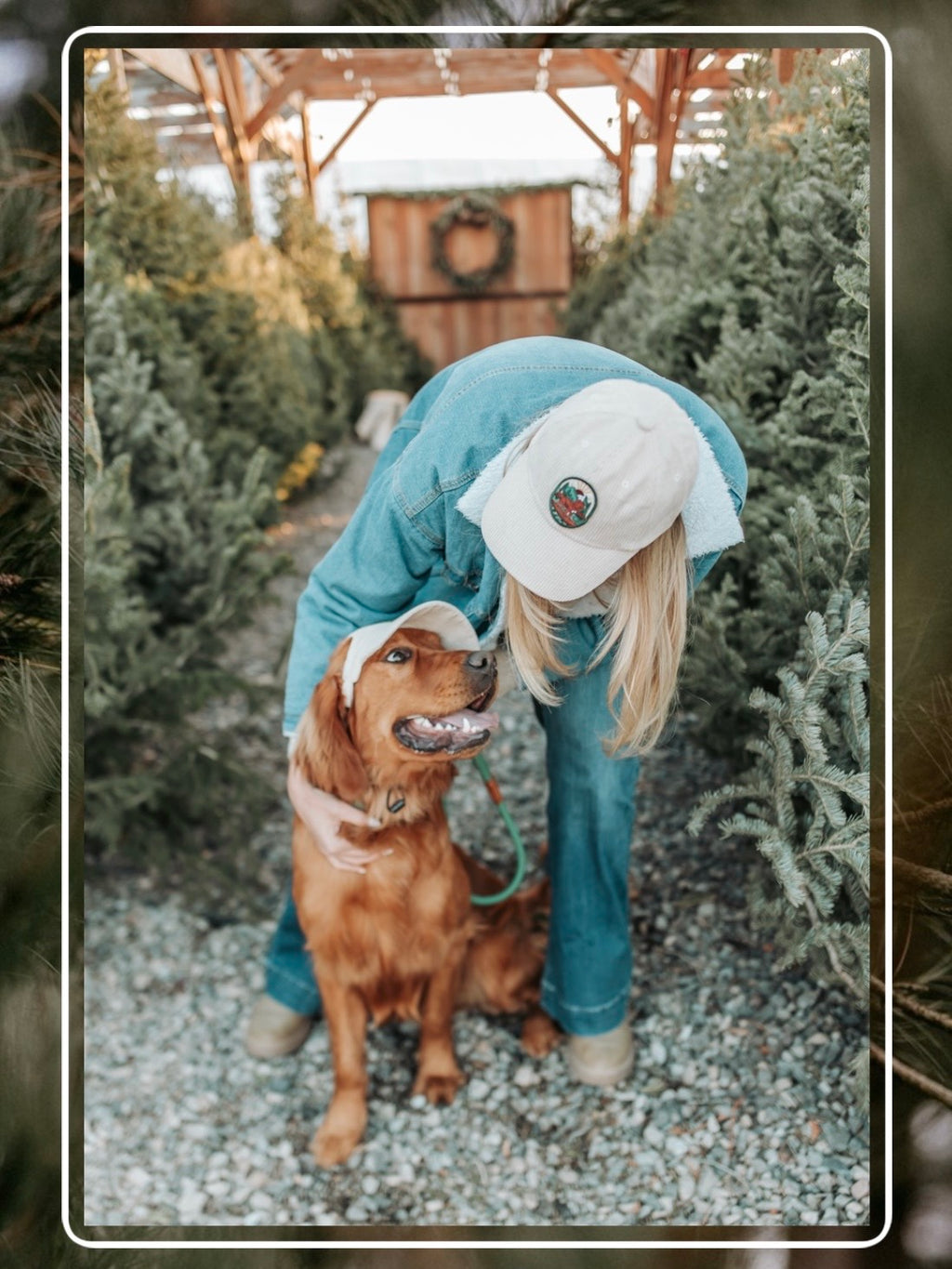 Lifestyle photo of a woman and her golden retriever wearing matching Kodiak adventure corduroy hats during an outdoor walk in the cream color and iron on patch.