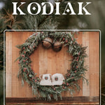 Cream corduroy human and dog hat set featuring the Kodiak adventure paddleboard iron on patch with a golden retriever, mountains, sun, and water.