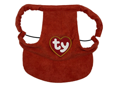 Rust orange corduroy dog hat featuring a red heart patch with white “TY” lettering and gold border, inspired by classic tag designs — part of The Golden Life patch collection.