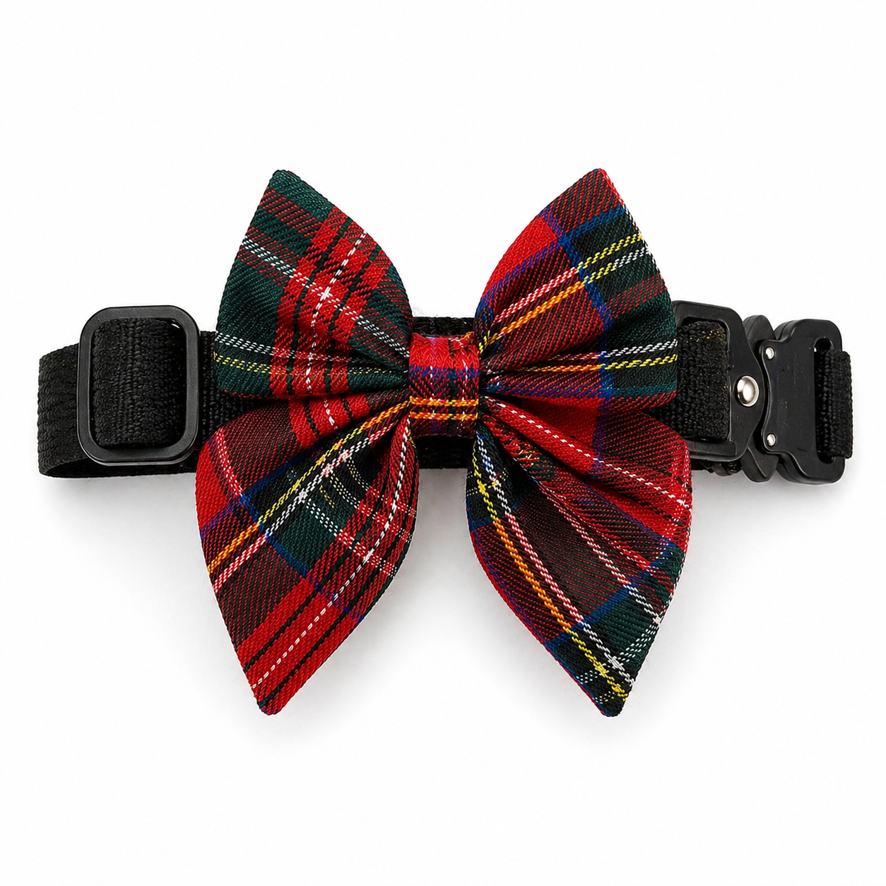 Red and green plaid dog bow attached to a black dog collar on a white background